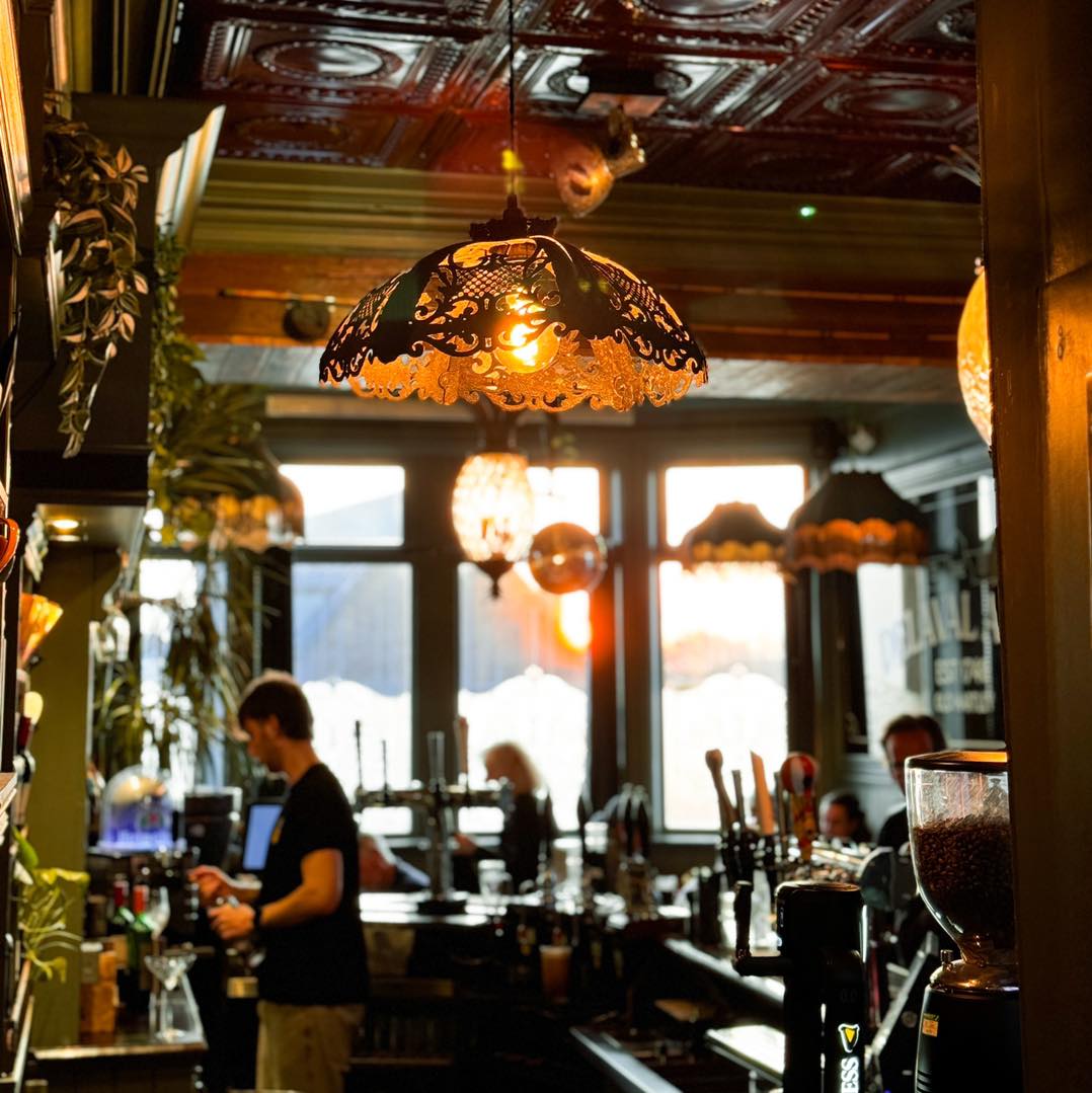 Warm lights and original details above the Delaval Arms bar